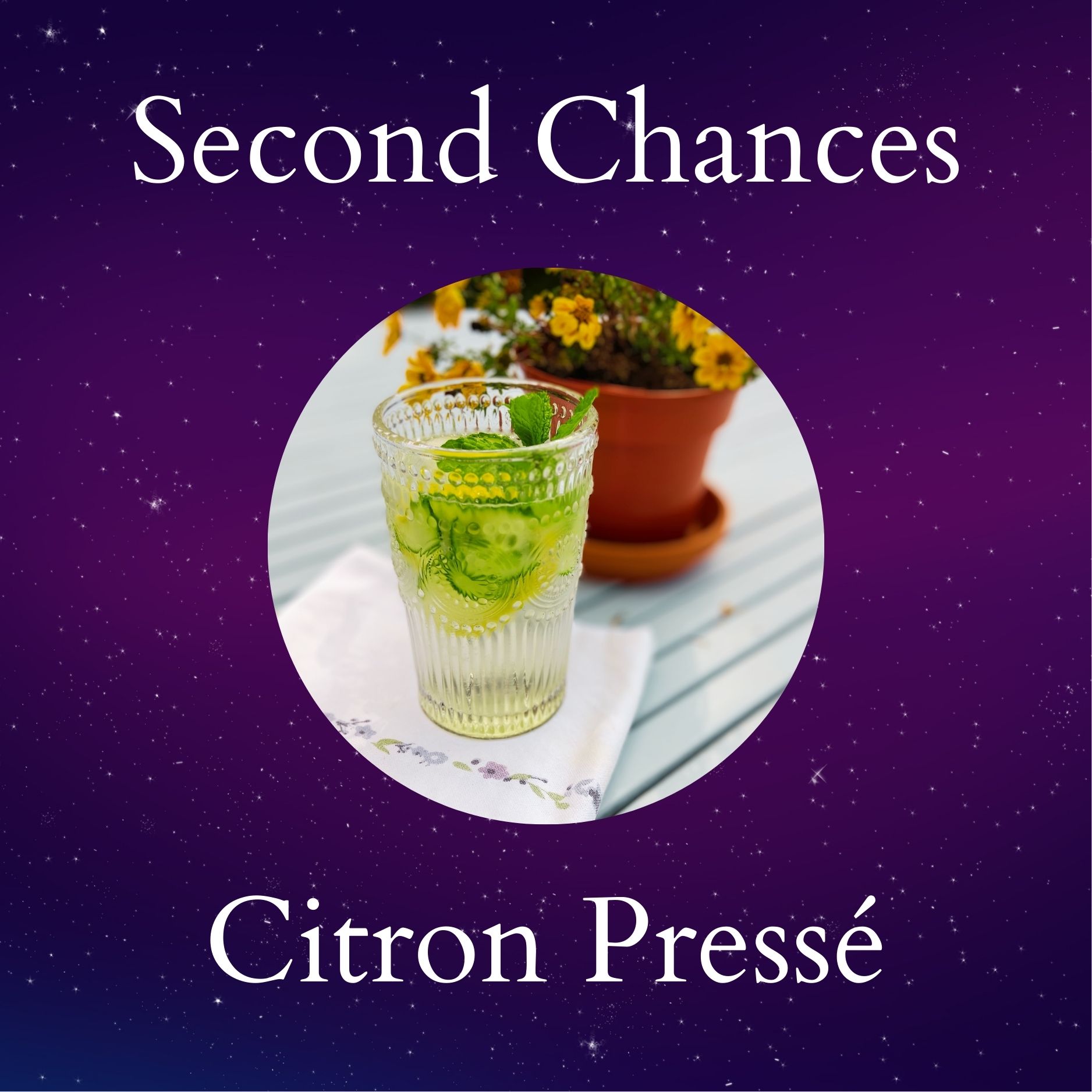 Glass of Citron Presse next to a flower pot on a purple background